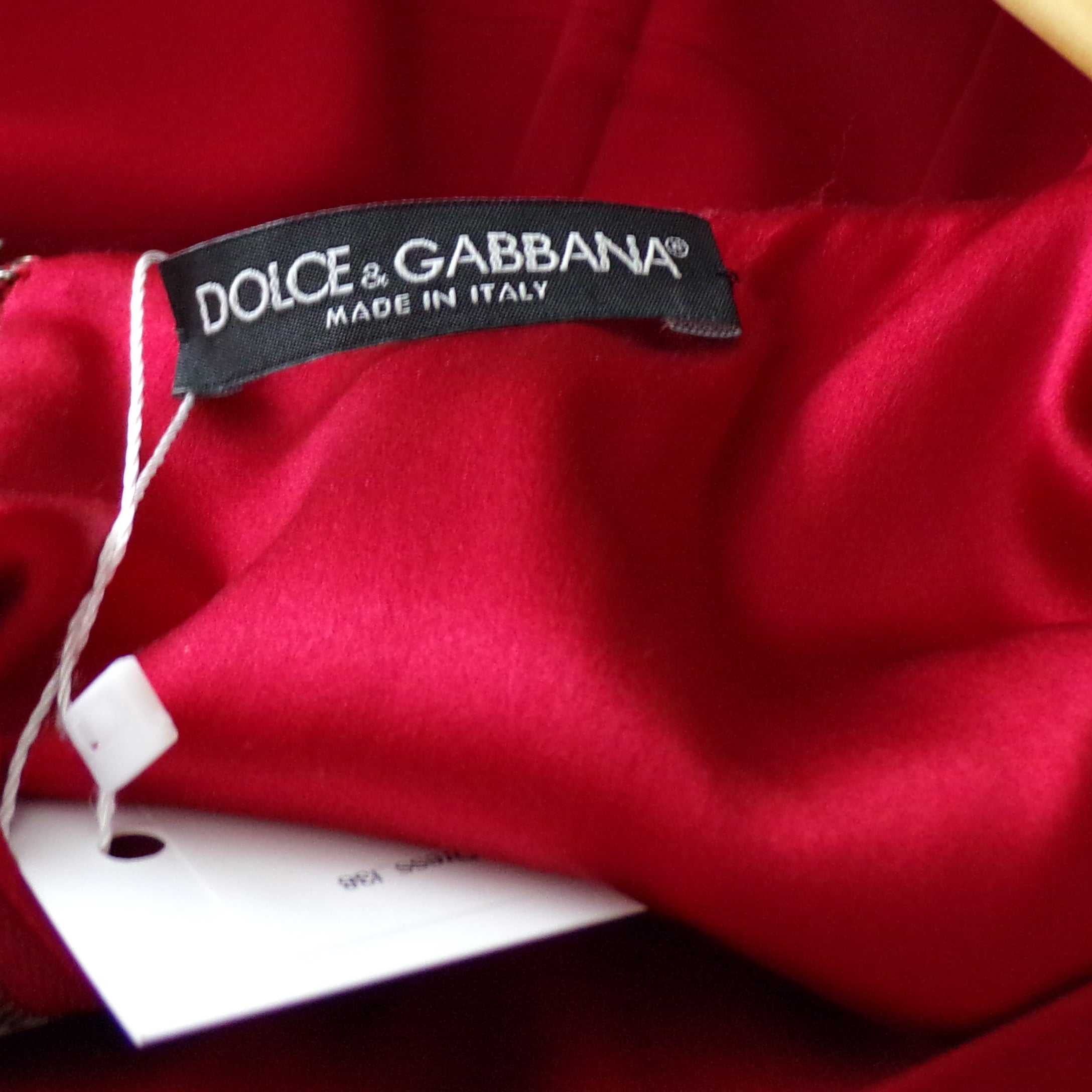 Dolce and Gabbana red crepe dress, sleeveless, midi length, size XS.