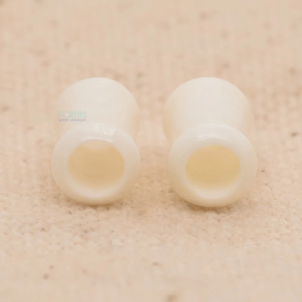 4 gauge double flared bone eyelets