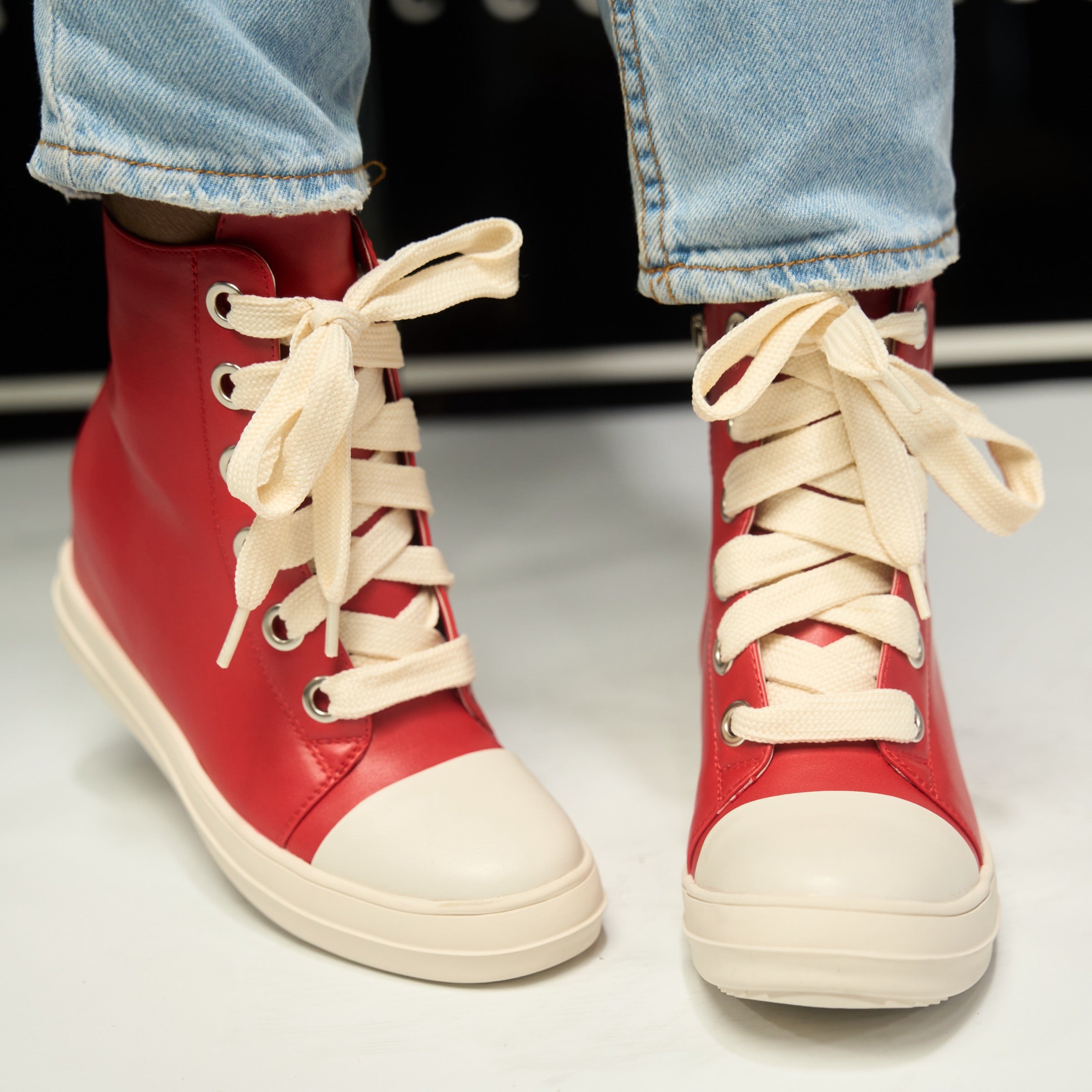 red lace-up sneakers