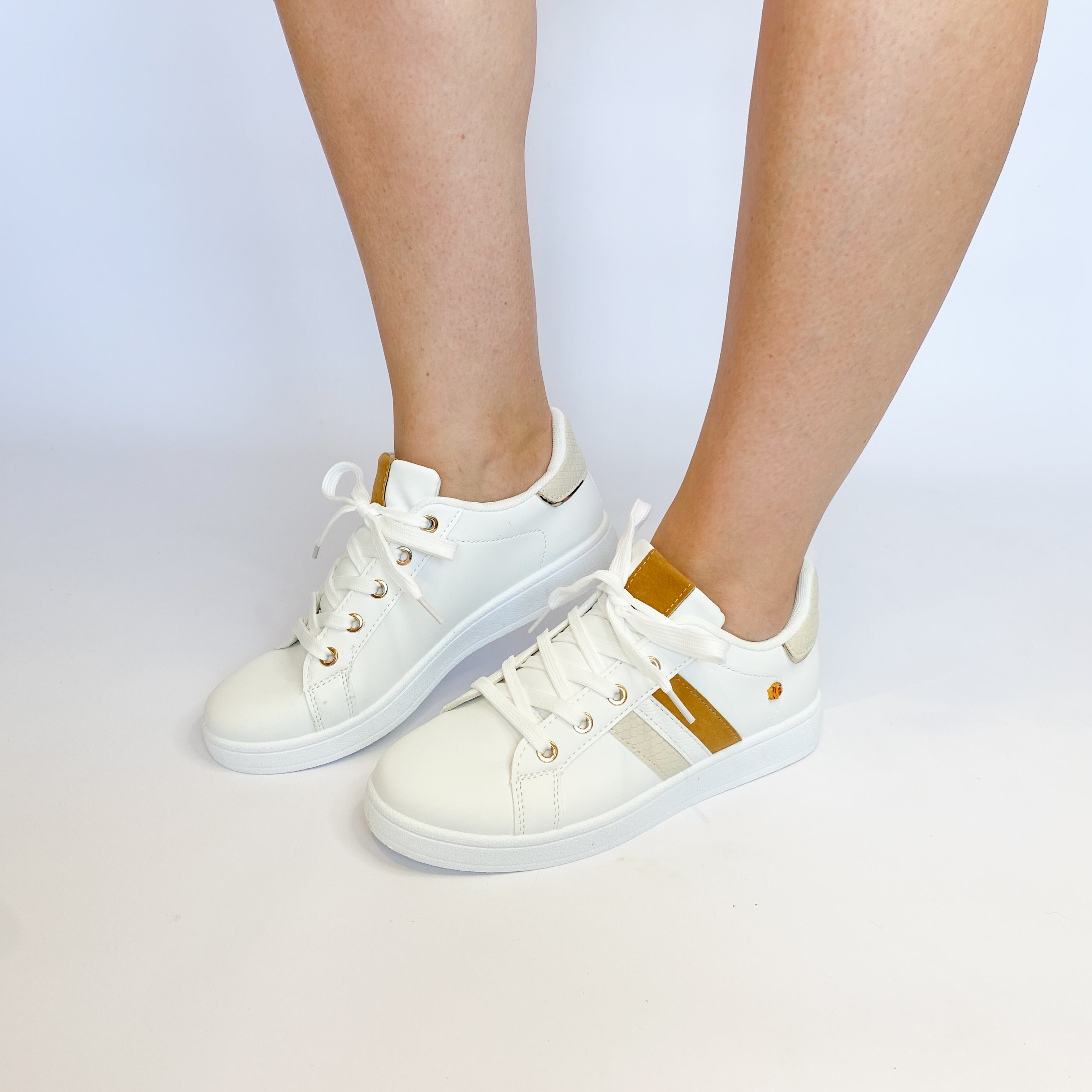 White and beige striped sneaker by KG.