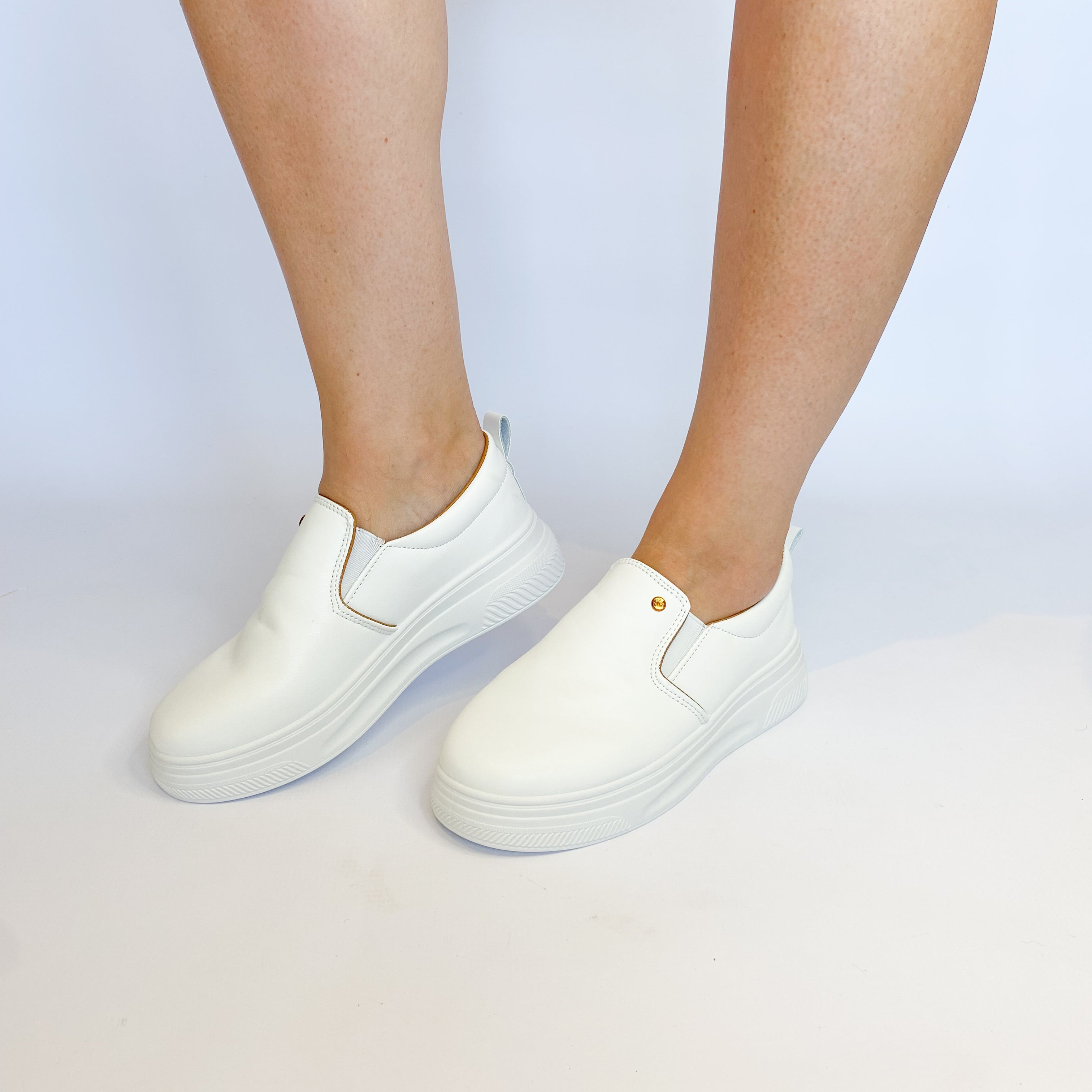 White slip on sneakers by KG